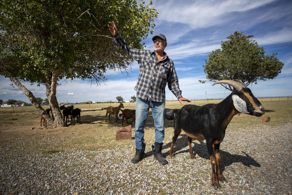 Bill Mendenhall, a corrections officer and registered Republican, speaks to the Associated Press at his ranch in Estancia, N.M., Sept. 29, 2022. Mendenhall said anger still smolders in the community over the outcome of the 2020 presidential election. Trump won two-thirds of the vote in Torrance County. (AP Photo/Andres Leighton)