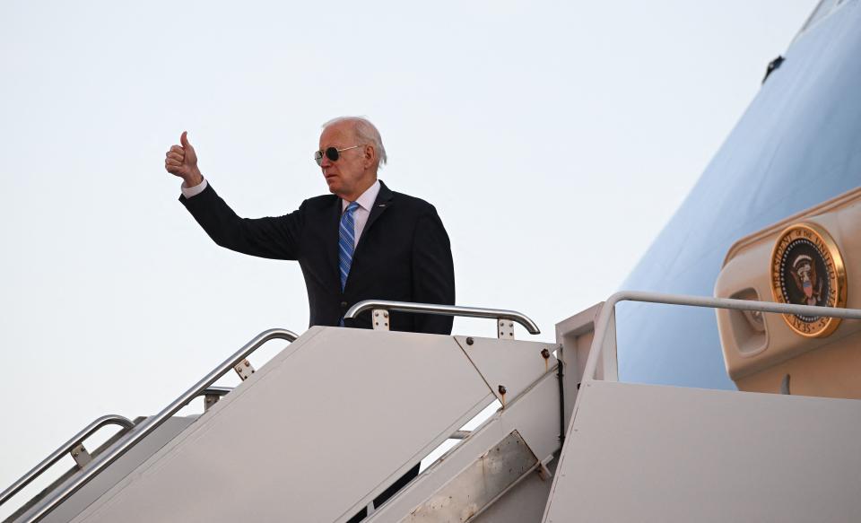 US President Joe Biden gives a thumb's up as he boards Air Force One at John F. Kennedy International Airport on September 22, 2022, as he returns to Washington, DC. (Photo by MANDEL NGAN / AFP) (Photo by MANDEL NGAN/AFP via Getty Images)