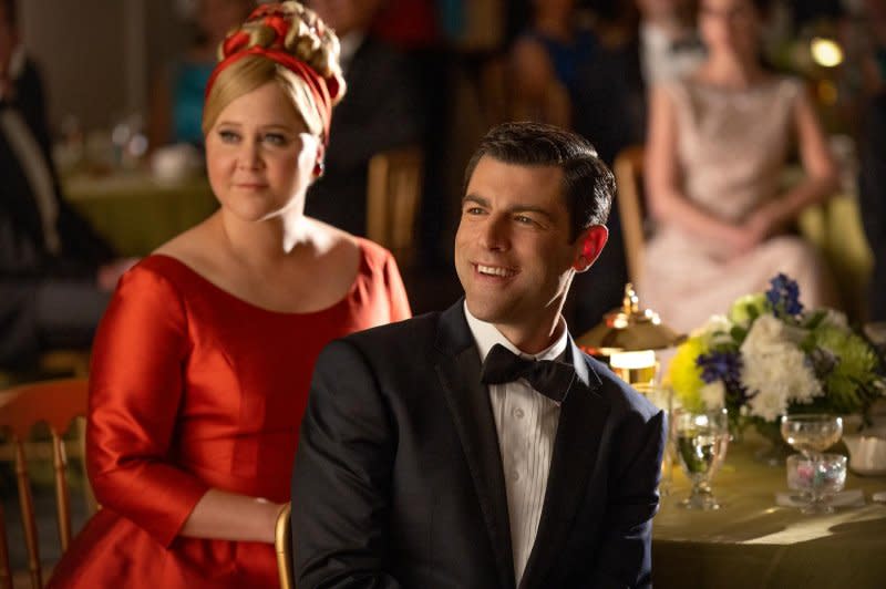 Amy Schumer and Max Greenfield play Post executives in "Unfrosted." Photo courtesy of Netflix