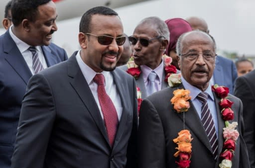 Ethiopia and Eritrea agreed to end their war after intensive talks driven by Ethiopian Prime Minister Abiy Ahmed (front left) seen here with Eritrean Foreign Minister Osman Saleh Mohammed