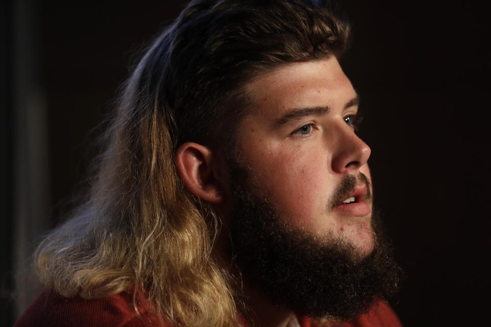 Washington State offensive lineman Liam Ryan answers question during the Pac-12 Conference NCAA college football Media Day Wednesday, July 24, 2019, in Los Angeles. (AP Photo/Marcio Jose Sanchez)