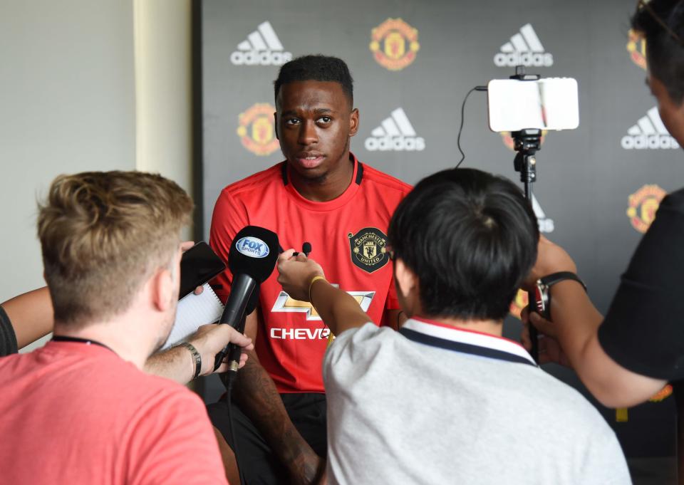 Manchester United's new signing Aaron Wan-Bissaka fielding media questions during a fan event by adidas at The Float@Marina Bay. (PHOTO: Zainal Yahya/Yahoo News Singapore) 