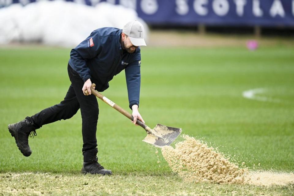 The game between Dundee and Rangers has been postponed again despite the best efforts of the Dens Park ground staff. <i>(Image: SNS)</i>