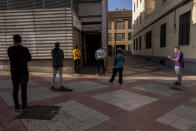 Residents queue outside an outpatient clinic in the southern neighbourhood of Vallecas in Madrid, Spain, Tuesday, Sept. 22, 2020. In Spain, nearly 36,000 have died and more than 1.2 million have contracted the virus, although the real infection tally could be at least three times higher. (AP Photo/Bernat Armangue)