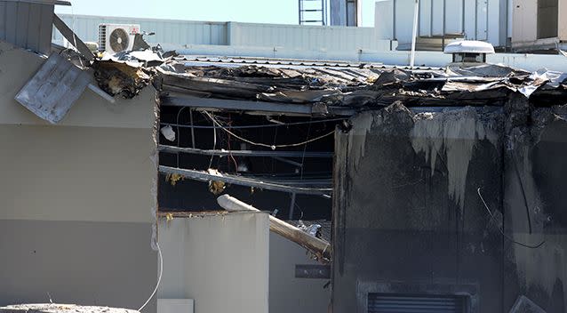 The damage at the back of the DFO building where the plane hit. Source: AAP