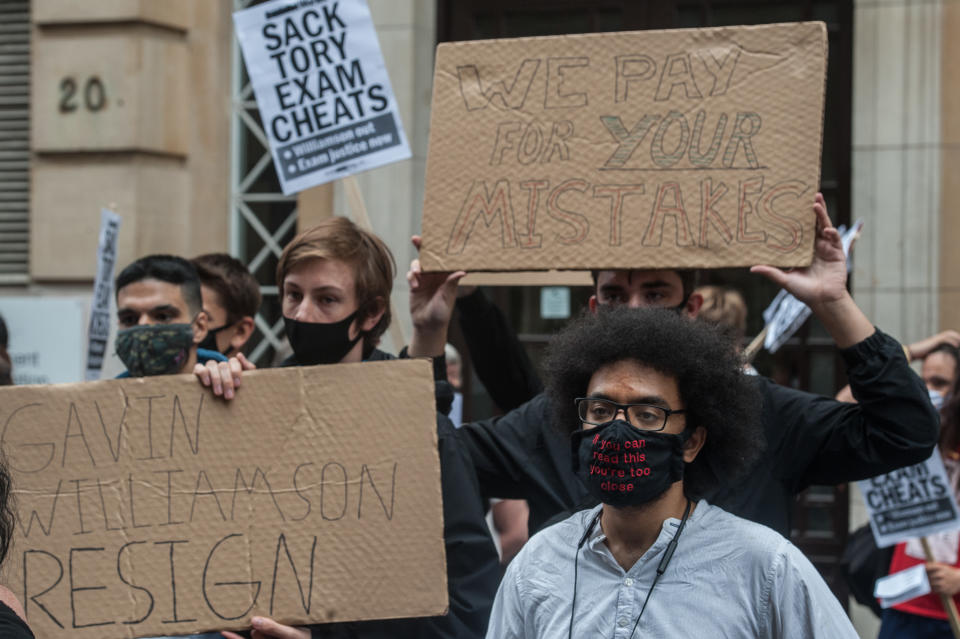 LONDON, ENGLAND - AUGUST 14: Students and teachers protest outside the Department for Education over the downgrading of A-level results on August 14, 2020 in London, England. (Photo by Guy Smallman/Getty Images)