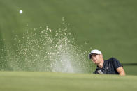 Aaron Wise hits out of a bunker on the eighth hole during the third round of the Wells Fargo Championship golf tournament at Quail Hollow, Saturday, May 8, 2021, in Charlotte, N.C. (AP Photo/Jacob Kupferman)