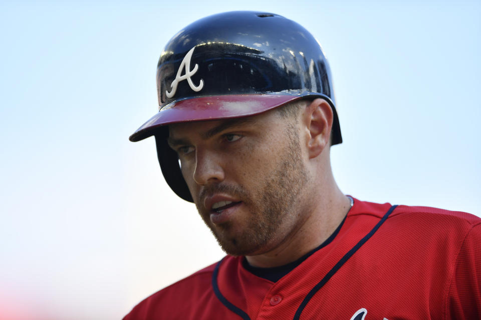 Atlanta Braves Freddie Freeman (5) stands on first base in first in the first inning during Game 2 of a best-of-five National League Division Series against the St. Louis Cardinals, Friday, Oct. 4, 2019, in Atlanta. (AP Photo/John Amis)