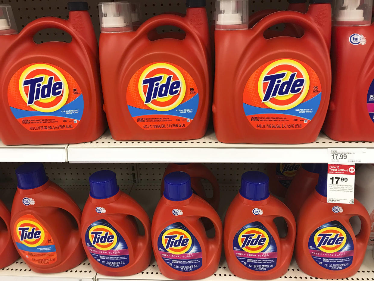 Procter & Gamble's Tide laundry detergent fills the shelves of a department store on Thursday, June 14, 2018, in Aventura, Fla. (AP Photo/Brynn Anderson)