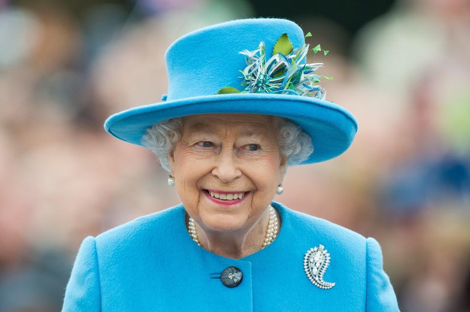 2016: Queen Elizabeth II tours Queen Mother Square on October 27, 2016, in Poundbury, Dorset.