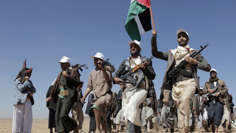 Houthi fighters march during a rally of support for the Palestinians in the Gaza Strip and against the U.S. strikes on Yemen outside Sanaa on Monday, Jan. 22, 2024.