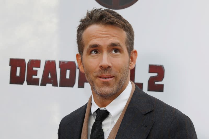 FILE PHOTO: Actor Ryan Reynolds poses on the red carpet during the premiere of "Deadpool 2" in Manhattan, New York