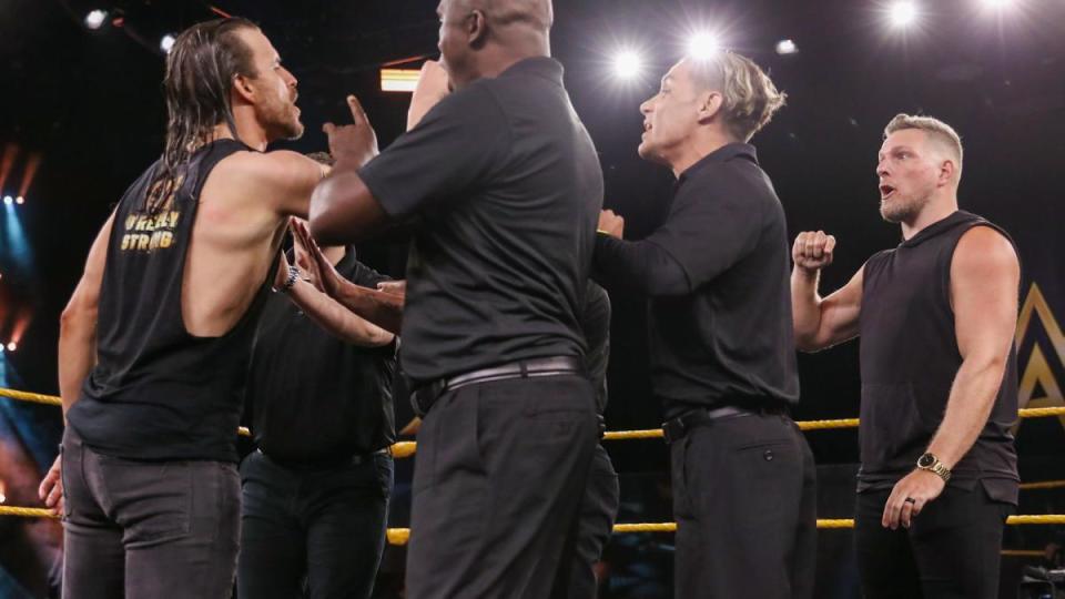 WWE's Adam Cole and former NFL punter Pat McAfee confront each other on an episode of 'NXT.' (Photo courtesy of WWE)