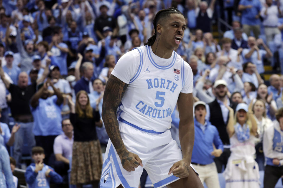 FILE - North Carolina forward Armando Bacot reacts after he dunked against Duke during the first half of an NCAA college basketball game Saturday, March 4, 2023, in Chapel Hill, N.C. Bacot was named to the preseason AP All-America men’s NCAA college basketball team, revealed Monday, Oct. 23, 2023.(AP Photo/Chris Seward, File)