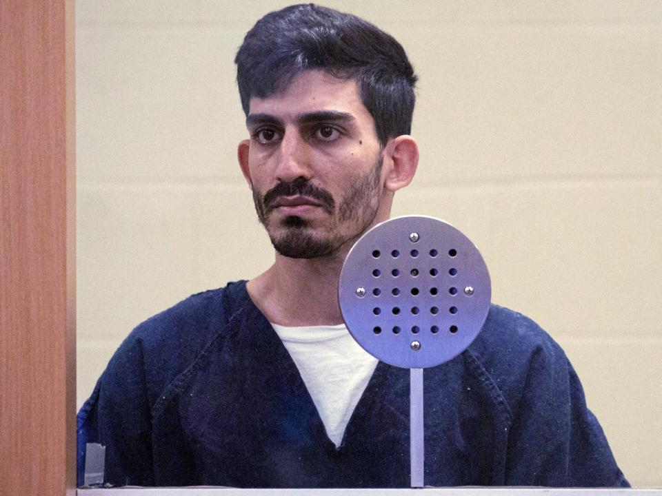 Ali Abulaban, 29, stands during his arraignment for a double homicide at the San Diego Central Courthouse on Monday, Oct. 25, 2021 in San Diego (AP)