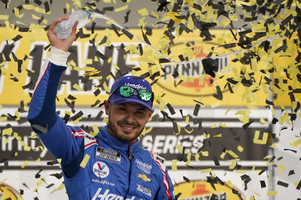 Kyle Larson celebrates after winning a NASCAR Cup Series auto race Sunday, March 7, 2021, in Las Vegas. (AP Photo/John Locher)