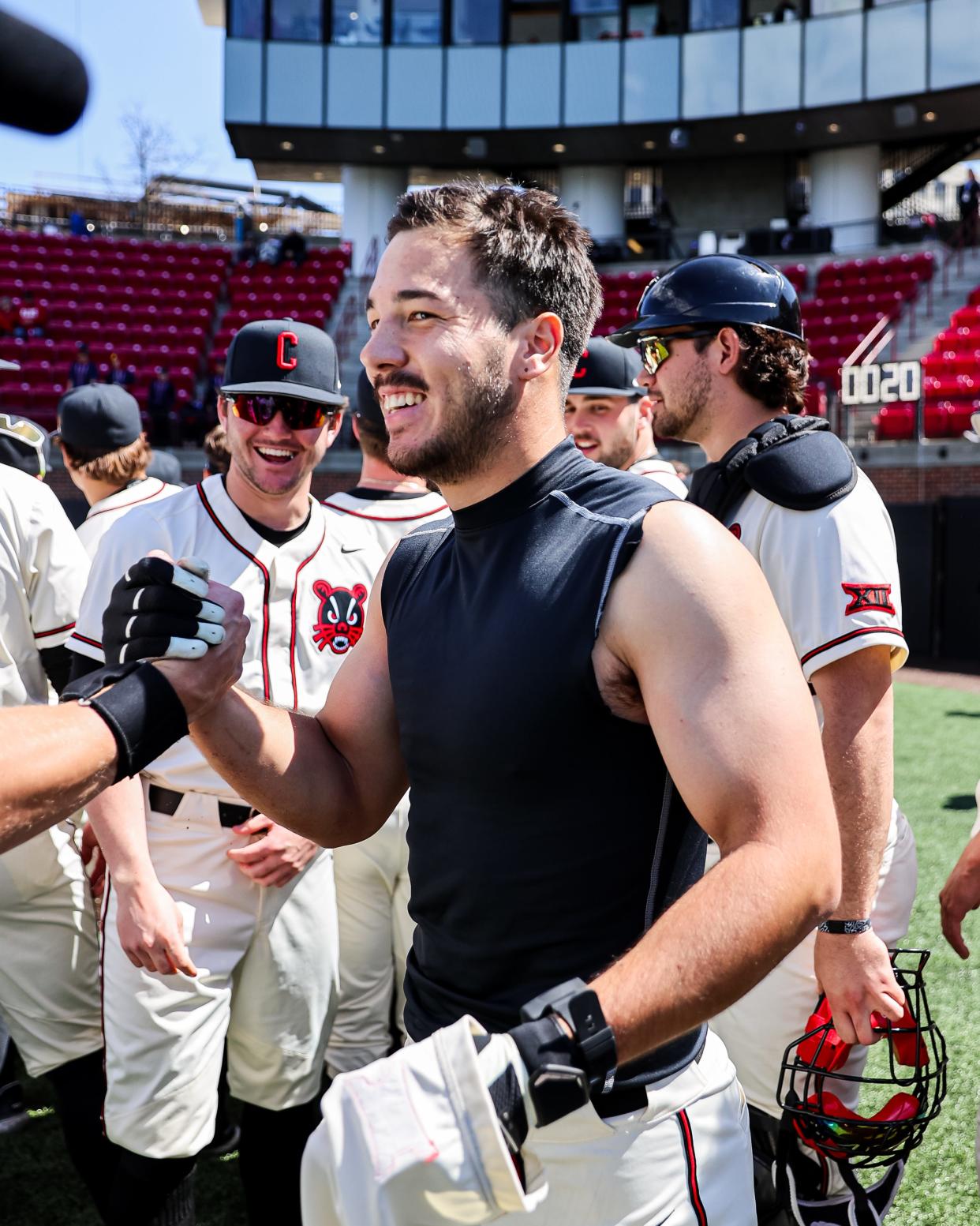 Kerrington Cross is all smiles after delivering a two-run homer to end the game in UC's 13-2 run-rule victory over TCU. It gave UC a three-game sweep of the Horned Frogs who were the preseason Big 12 favorite.