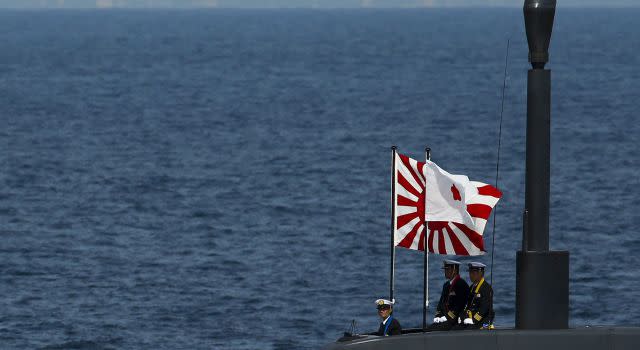 Japanese officers stand aboard a Soryu submarine during a fleet review in Sagami Bay last year.