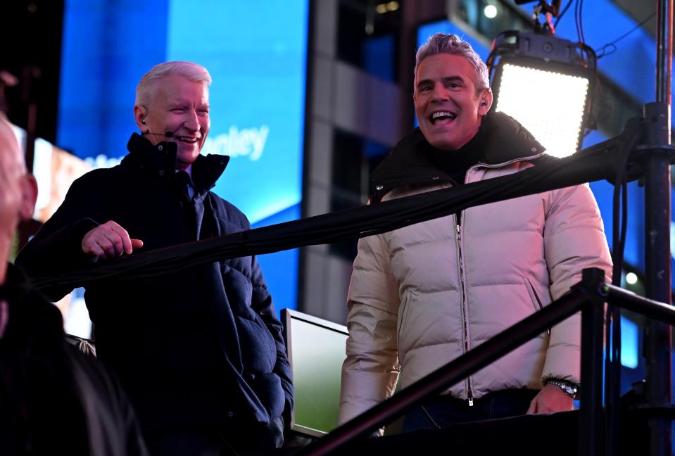 Andy Cohen and Anderson Cooper speak onstage during the Times Square New Year's Eve 2024 Celebration on Dec. 31, 2023 in New York City. (Photo by Noam Galai/Getty Images)