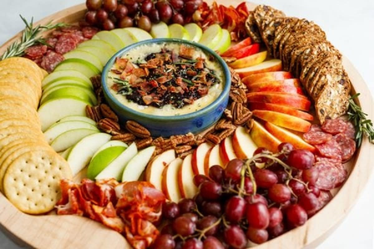 <p>Reluctant Entertainer</p><p>This festive winter brie charcuterie board, made on a 20-inch “big board,” is on the table in 30 minutes. It's such a delicious recipe!</p><p><strong>Get the recipe: </strong><a href="https://reluctantentertainer.com/winter-brie-charcuterie-board/" rel="nofollow noopener" target="_blank" data-ylk="slk:Winter Brie Charcuterie Board;elm:context_link;itc:0;sec:content-canvas" class="link rapid-noclick-resp"><strong>Winter Brie Charcuterie Board</strong></a></p><p><strong>Related: <a href="https://parade.com/food/how-to-make-a-charcuterie-tree" rel="nofollow noopener" target="_blank" data-ylk="slk:How to Make a Charcuterie Tree;elm:context_link;itc:0;sec:content-canvas" class="link rapid-noclick-resp">How to Make a Charcuterie Tree</a></strong></p>