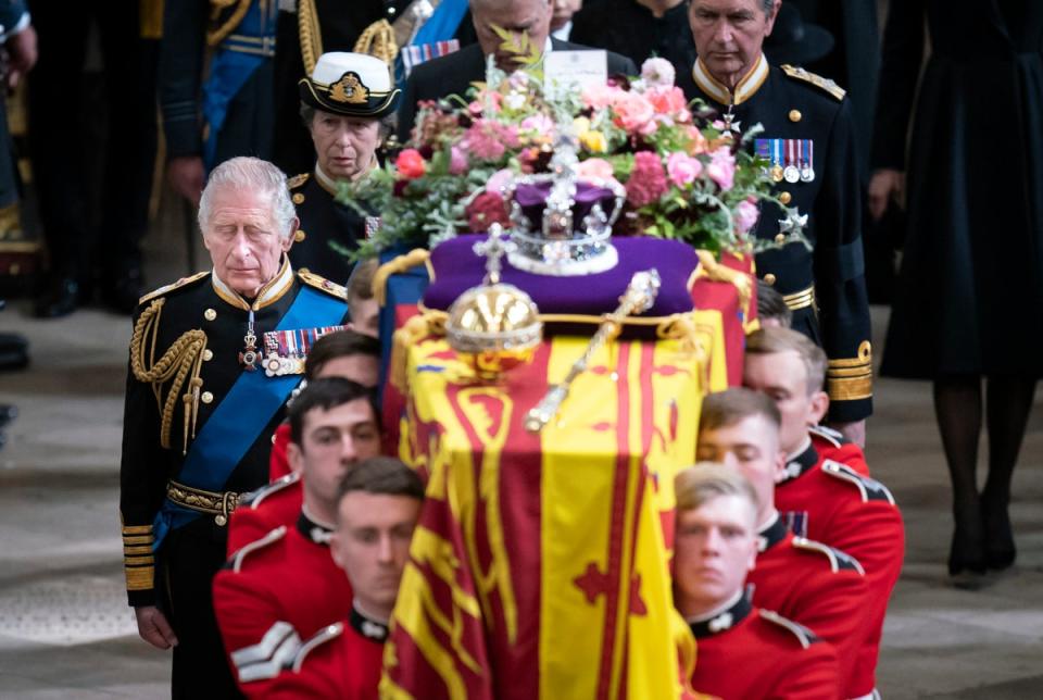 King Charles III and members of the royal family follow behind the coffin of Queen Elizabeth II (Danny Lawson/PA)