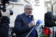 WikiLeaks editor-in-chief Kristinn Hrafnsson addresses Julian Assange supporters outside the High Court in London, Thursday, Oct. 28, 2021. The U.S. government is this week asking Britain's High Court to overturn a judge's decision that WikiLeaks founder Julian Assange should not be sent to the United States to face espionage charges. A lower court judge refused extradition in January on health grounds, saying Assange was likely to kill himself if held under harsh U.S. prison conditions. (AP Photo/David Cliff)