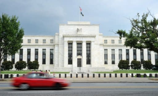 The US Federal Reserve building is seen on August 9, 2011 in Washington, DC. The US Federal Reserve left unchanged near-zero interest rates and its massive bond-buying program on Wednesday, saying growth was modest in the world's largest economy