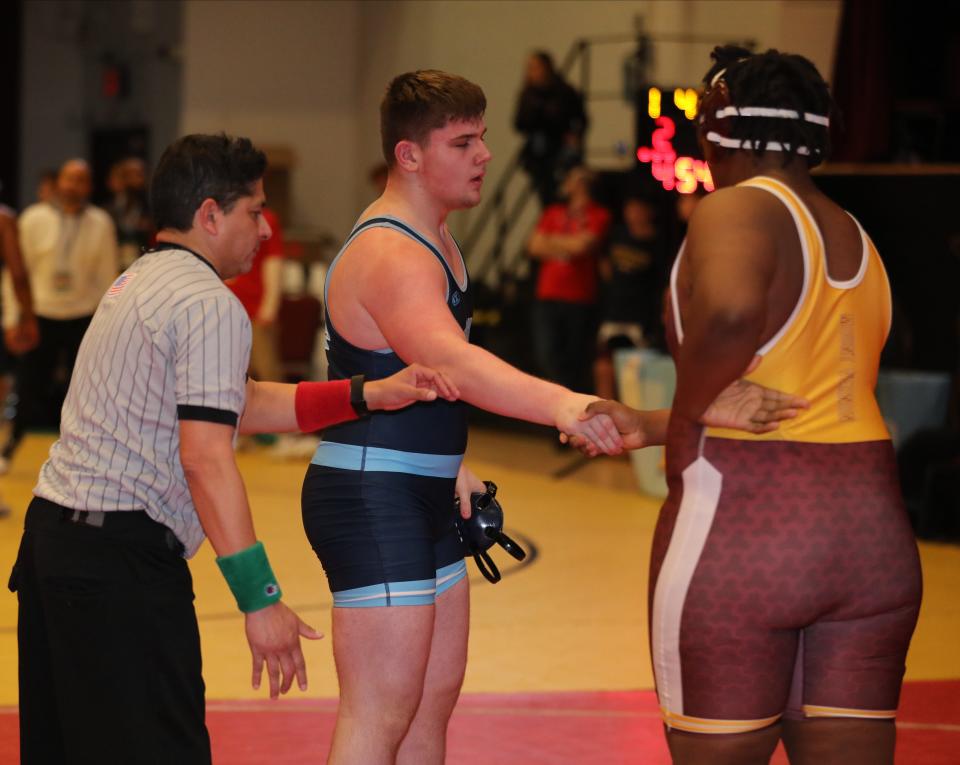 Naquan Keitt from Mount Vernon wrestled Michael Mauro from John Jay East Fishkill in the 285 pound match, during the first day of the Section One Division I championships at the Westchester County Center in White Plains, Feb. 10, 2024.