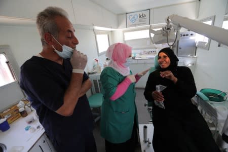 Displaced Syrian refugee treated at mobile dental clinic near Azaz