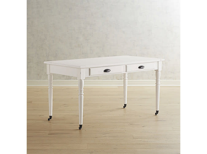 <p>Not your average craft table.</p> <p><a rel="nofollow noopener" href="http://www.pier1.com/magnolia-home-primitive-white-table-desk/3261360.html" target="_blank" data-ylk="slk:Primitive White Table Desk;elm:context_link;itc:0;sec:content-canvas" class="link "><em>Primitive White Table Desk</em></a><em> ($650)</em></p>