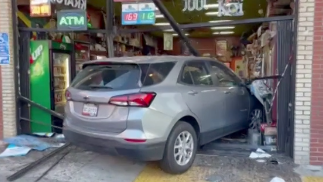 Driver plows into neighborhood smoke shop