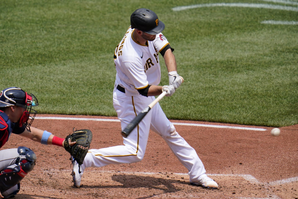 Pittsburgh Pirates' Jacob Stallings singles off Cleveland Indians relief pitcher Phil Maton, driving in a run, during the sixth inning of a baseball game in Pittsburgh, Sunday, June 20, 2021. (AP Photo/Gene J. Puskar)