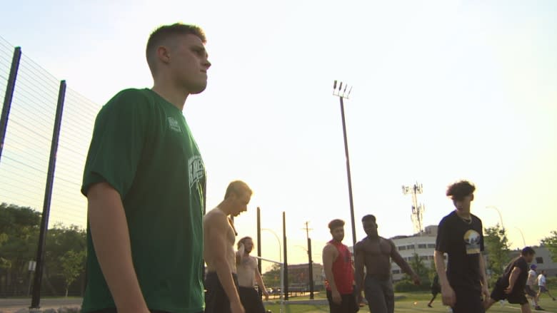 Gay football player finds acceptance after nearly quitting because of homophobia