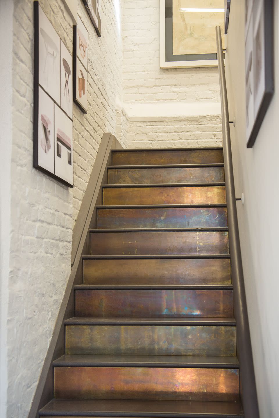 <p>A staircase painted in patinated brass by <a rel="nofollow noopener" href="https://deringhall.com/brands/rupert-bevan-ltd" target="_blank" data-ylk="slk:Rupert Bevan Ltd;elm:context_link;itc:0;sec:content-canvas" class="link ">Rupert Bevan Ltd</a>.</p>