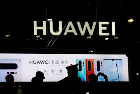 FILE PHOTO: A Huawei company logo is seen at CES Asia 2019 in Shanghai