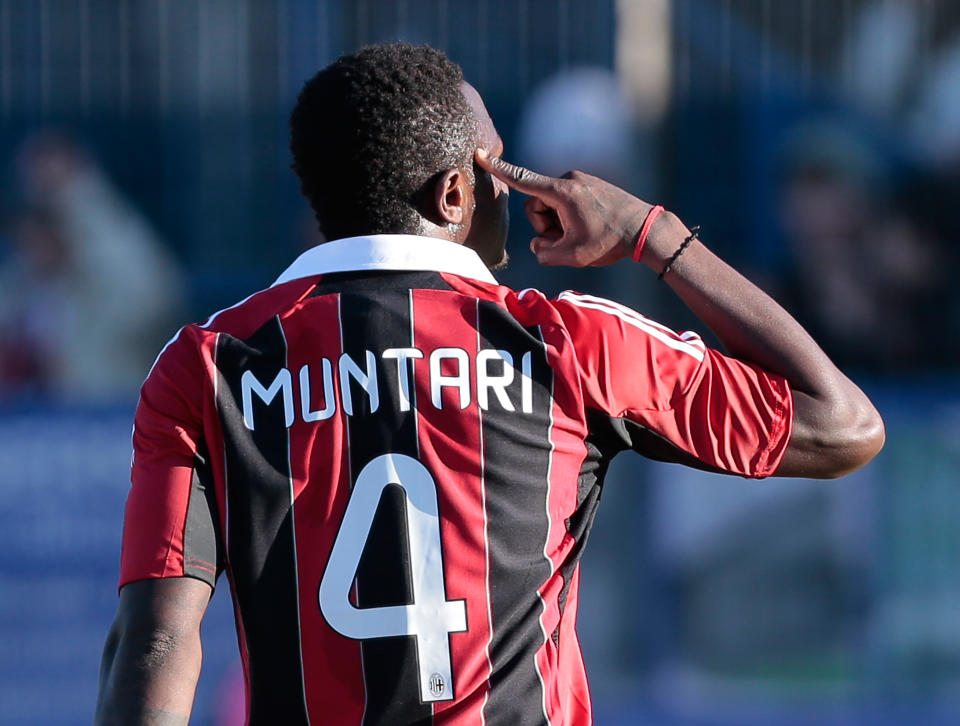 AC Milan Ghana midfielder Sulley Muntari gestures towards the crowd in Busto Arsizio, near Milan, Italy, Thursday, Jan. 3, 2012. A friendly match between AC Milan and lower division club Pro Patria was abandoned Thursday after racist chants directed at Milan's black players, the latest incident of racial abuse that continues to blight the sport. After repeated chants directed his way, Ghana midfielder Kevin-Prince Boateng picked up the ball and kicked it at a section of the crowd in the 26th minute of the first half. Boateng then took off his shirt and walked off the pitch with his Milan teammates. Urby Emanuelson, Sulley Muntari and M'Baye Niang were also targeted by the chants. (AP Photo/Emilio Andreoli)