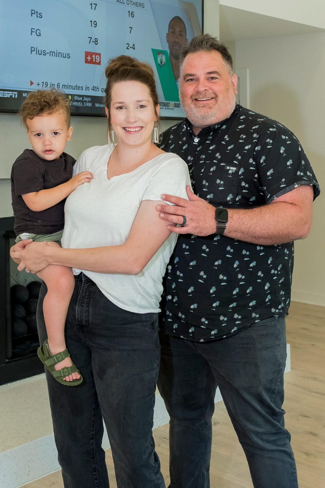 Beck, Tia and Robert Williams love their home on the lake.