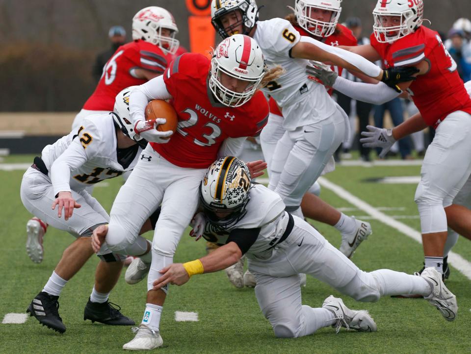 Preston Blubaugh runs the ball during Reeds Spring's 49-20 win over Sullivan in a Class 3 state semifinal football game on Saturday, Nov. 26, 2022, in Reeds Spring, Missouri.