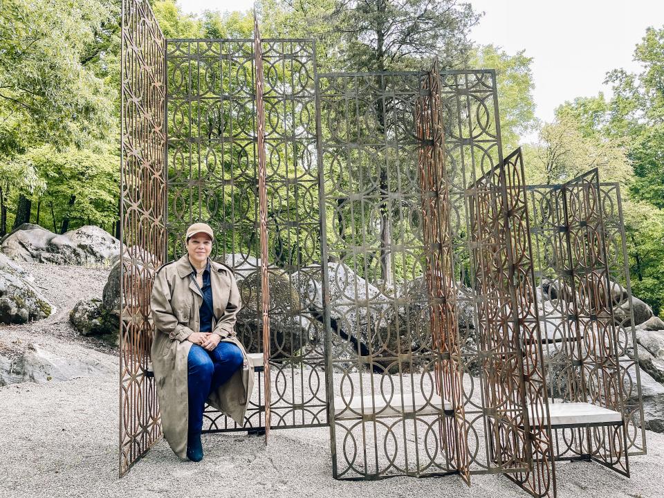 Puerto-Rican born, Chicago-based artist, curator and educator Edra Soto visits the "Graft Knoxville" sculpture she designed on May 6, 2022 at the University of Tennessee/GATOP Arboretum & Education Center. “It is such an inspiring site; seeing the work here made me feel there is a connection to my homeland and to Chicago where I live,” said Soto. “It allowed me to unveil the cultural value of these seemingly simple patterns that appear in the homes of Puerto Rico.”