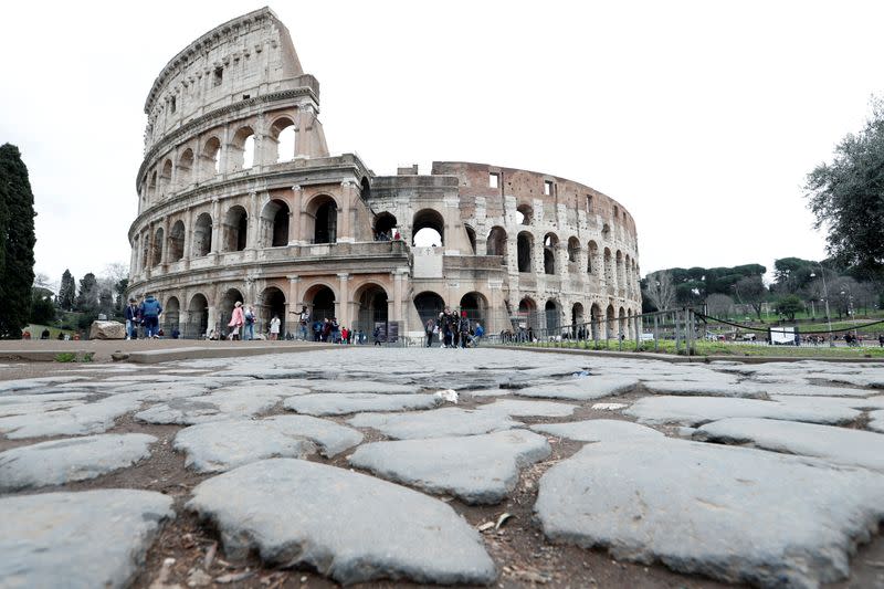 Few tourists by the Colosseum as Italy's tourism industry hit due to coronavirus outbreak, in Rome