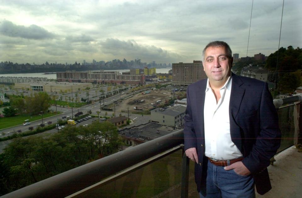 In this 2004 photo, Fred Daibes is building aluxurious apartment tower on Gorge Road in Edgewater with magnificent views of the Hudson River and the Manhattan skyline.  Daibes stands in  the first floor lobby.