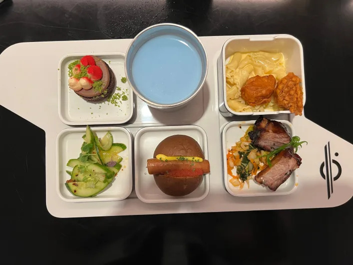 a tray of lunch and blue milk at the star wars galactic starcruiser