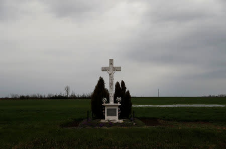 A cross is seen in the village of Bacsszentgyorgy, Hungary, March 31, 2018. REUTERS/Bernadett Szabo