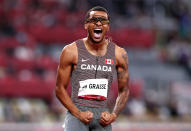 <p>Andre de Grasse of Team Canada wins gold in the Men's 200m Final at Olympic Stadium on August 4.</p>