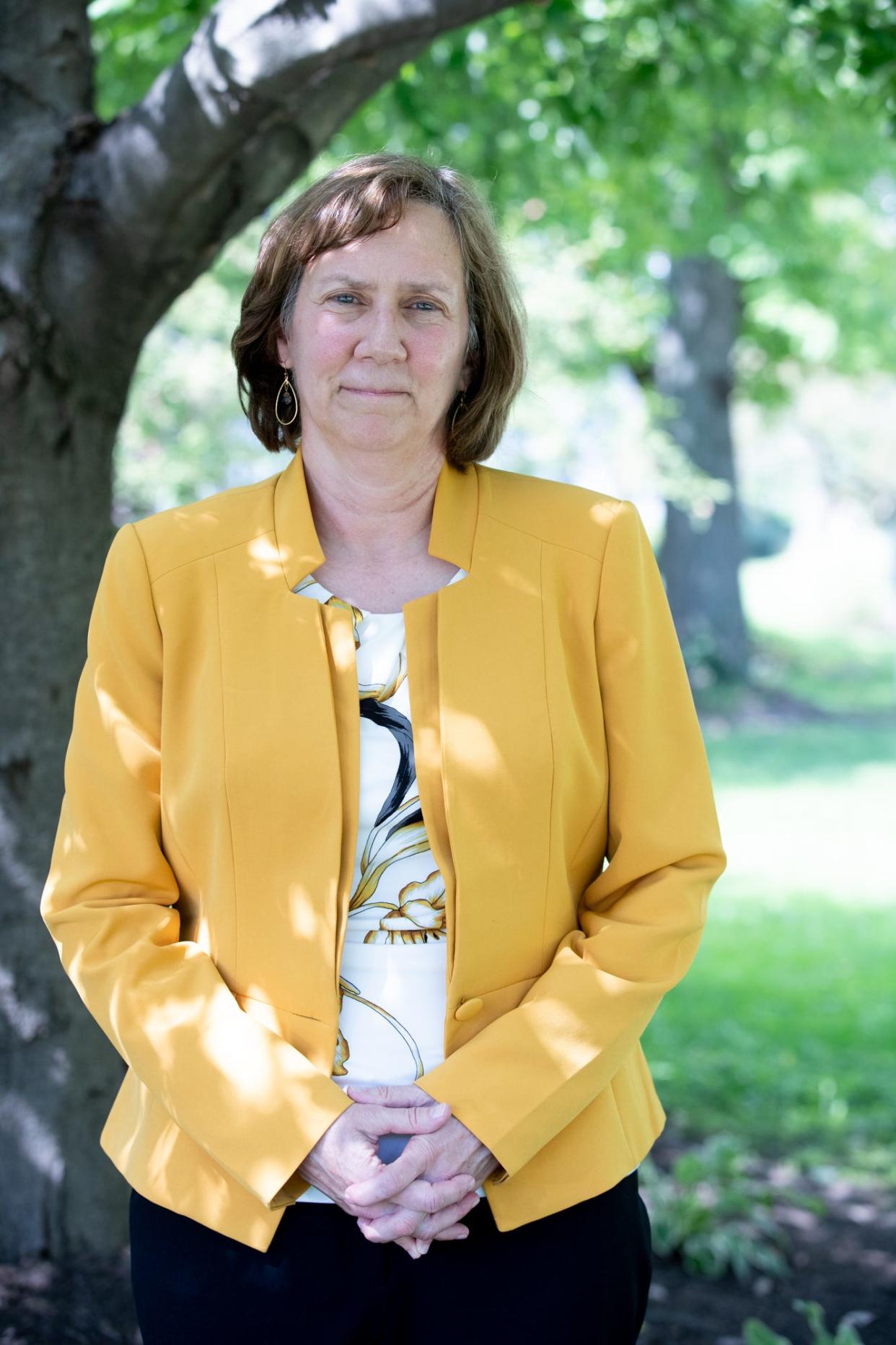 Lynn Starkey, a 2009 Teacher of the Year and former co-director of guidance at Roncalli High School, is shown outside her lawyer's office on Tuesday, Sept. 3, 2019. Starkey has found a new job but continues her legal fight which began after she learned her contract would not be renewed at Roncalli High School, where she "worked her entire adult life," 39 years. The Archdiocese of Indianapolis has said that she was "in breach of her contract with Roncalli High School because she is in a civil union that is considered 'contrary to a valid marriage as seen through the eyes of the Catholic Church.' "