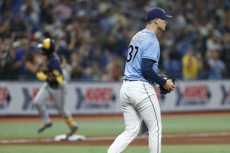 Tampa Bay Rays pitcher Matt Wisler walks back to the mound after giving up a home run to Milwaukee Brewers Andrew McCutchen during the sixth inning of a baseball game Tuesday, June 28, 2022, in St. Petersburg, Fla. (AP Photo/Scott Audette)