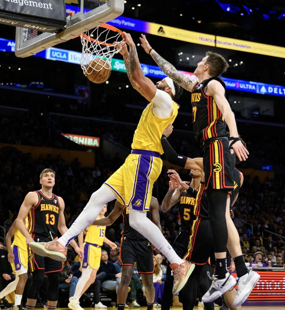 LOS ANGELES, CA - MARCH 18, 2024: Los Angeles Lakers forward Anthony Davis (3) scores.