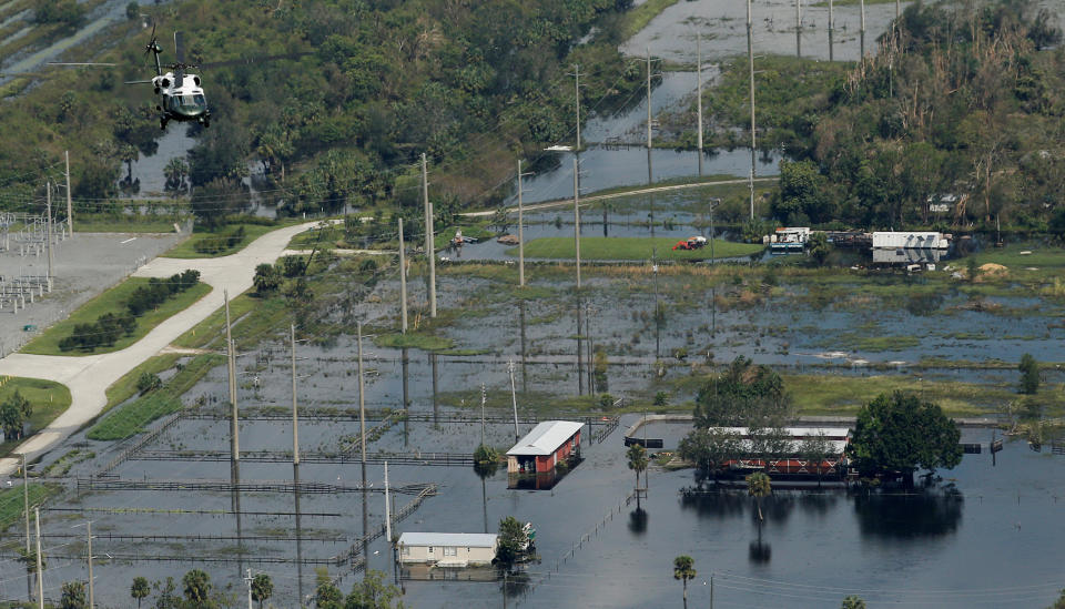 President Donald Trump flies aboard the Marine One helicopter ovver storm damage and flooding caused by Hurricane Irma near Fort Myers, Florida on Sept. 14, 2017.&nbsp;