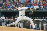 Texas Rangers starting pitcher Jacob deGrom throws against the Philadelphia Phillies during the first inning of an opening day baseball game, Thursday, March 30, 2023, in Arlington, Texas. (AP Photo/Jeffrey McWhorter)