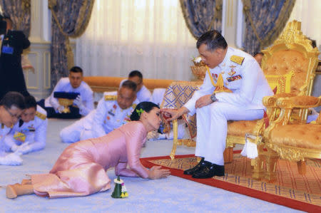 King Maha Vajiralongkorn and his consort, General Suthida Vajiralongkorn named Queen Suthida attend their wedding ceremony in Bangkok, Thailand May 1, 2019. Thailand Royal Household via REUTERS